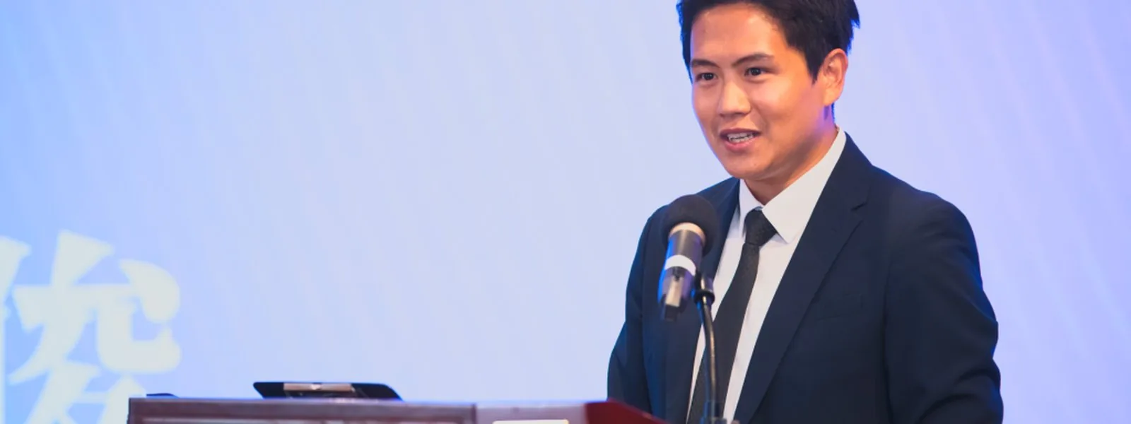 Charles Si, Deputy Director of the GBA Electronic Commerce Association, delivering remarks at the Bay Youth AI Connects The World forum, Macao Science Centre, 2 June 2026