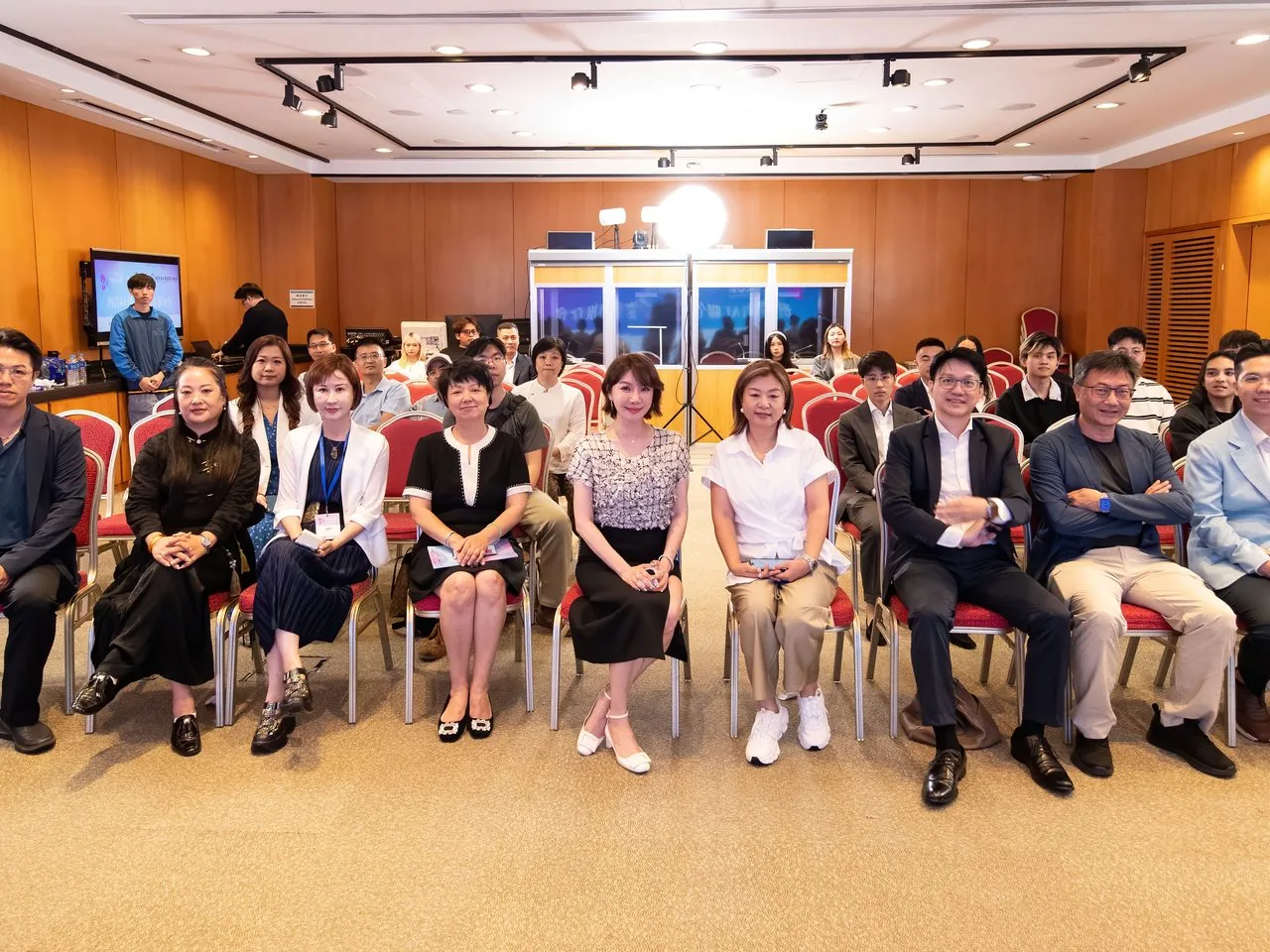 Group photo of VIP delegates seated in the Macao Science Centre auditorium after the Bay Youth AI forum, 2 June 2026