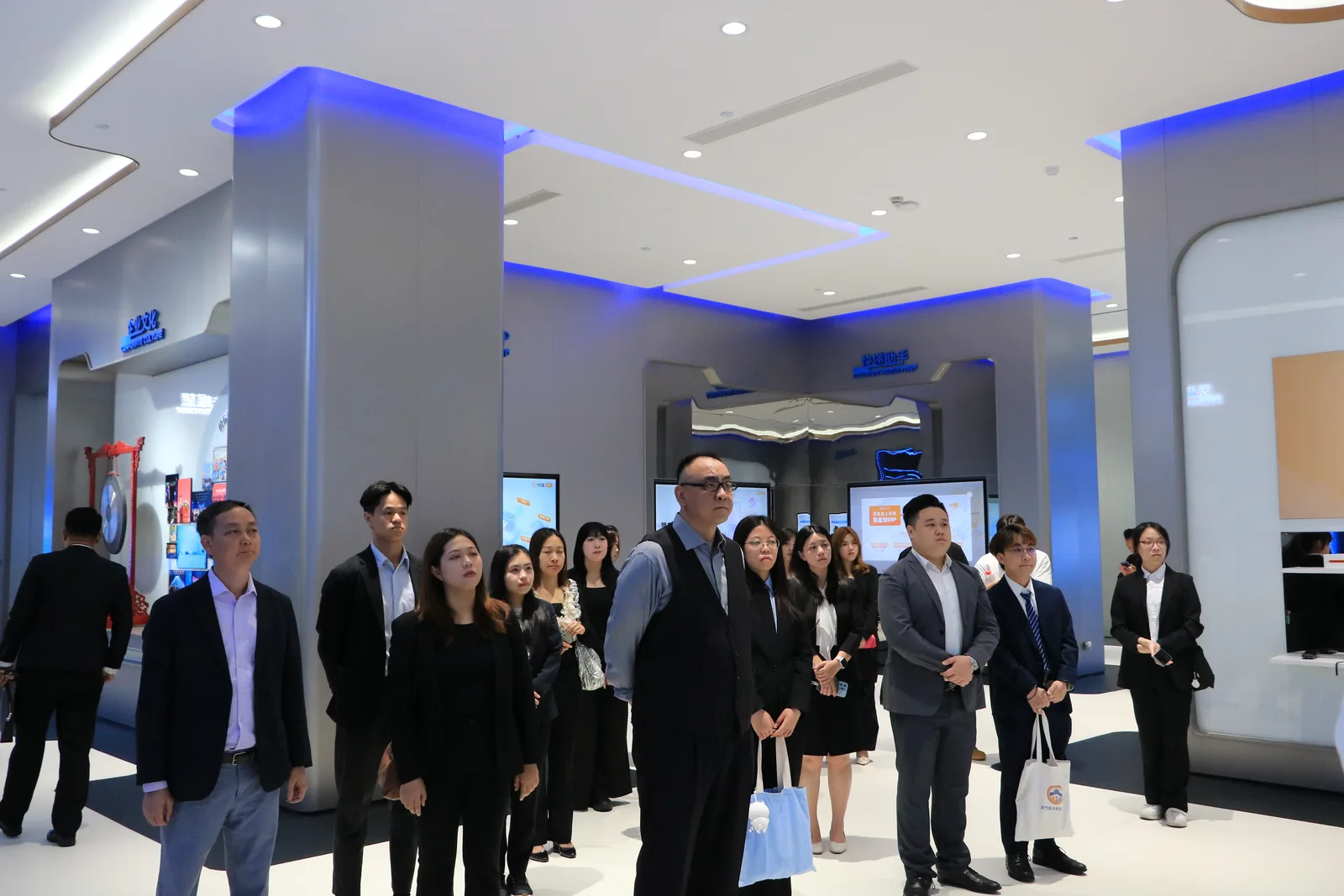 Delegation exploring the product showcase at the SaaS company's headquarters